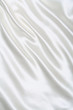Photo : Smooth elegant white silk can use as wedding background Smooth elegant white silk can use as wedding background