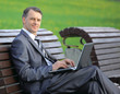 young guy is working outdoors