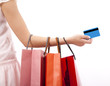 hand of woman holding shopping bags and credit card hand of woman holding shopping bags and credit card