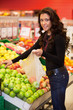 Young Woman Buying Fruit