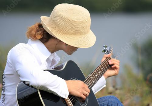 Photo: Girl with the guitar Girl with the guitar