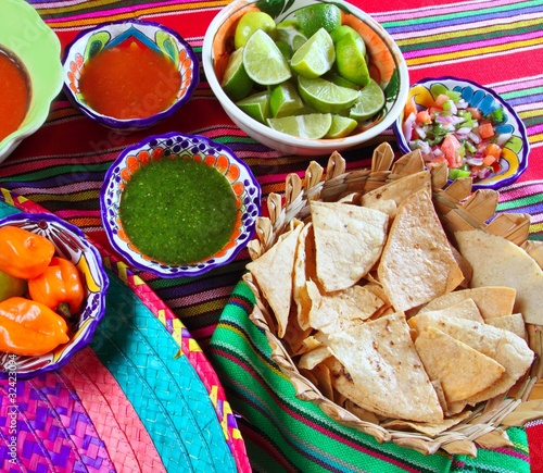 Photo: Mexican food varied chili sauces nachos lemon Mexican food varied chili sauces nachos lemon
