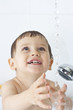 The little boy in a shower