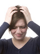 Foto: Woman with headache and hands on head Woman with headache and hands on head