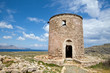 Old windmill against a striking sky