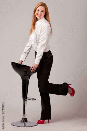 Photo: barstool and businesswoman barstool and businesswoman