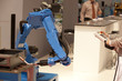 Foto: industrial robot arm industrial robot arm