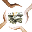 Dollar bills with multiracial human hands around it. Dollar bills with multiracial human hands around it.