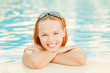 Smiling woman in bikini in pool