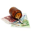 Tablettenglas und Tabletten auf Geldscheinen Tablettenglas und Tabletten auf Geldscheinen