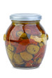 Green olives conserved with tomato and cheese in the glass jar Green olives conserved with tomato and cheese in the glass jar