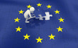 3d man finalizing European Union flag puzzle