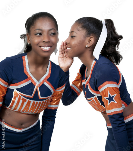 Photo: Woman whispering a secret Woman whispering a secret
