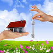 hands holding house hands holding house