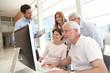 Photo: Senior people attending business training Senior people attending business training