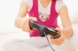 Closeup of girl playing video game