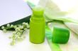 ����: Lily of the valley, a towel and a green deodorant on the table � jivanshreela #32531029
