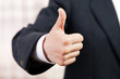Thumb up success sign gesture