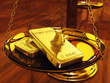 Gold ingots on brass scale ,3d illustration