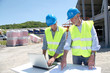 Industrial people working on building site Industrial people working on building site