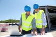Industrial people working on building site Industrial people working on building site