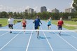 Photo: Runners On A Race Track At Finish Line Runners On A Race Track At Finish Line