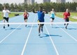 Photo: Runners On A Race Track At Finish Line Runners On A Race Track At Finish Line