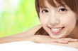 Beautiful asian girl with green background Beautiful asian girl with green background