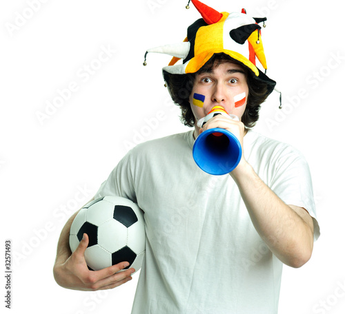 Photo: Football fan with ball and trumpet Football fan with ball and trumpet