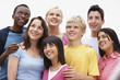 Group of multi ethnic friends standing together and looking up