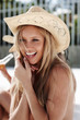 Cute sweet nude woman wearing a hat
