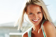 Portrait of cheerful young lady looking at you