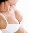 Cropped image of a sensual woman in white lingerie