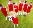 Top view of confident soccer team wearing red colored uniform