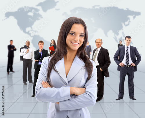 Photo: business woman and her team business woman and her team