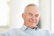 Closeup of a cheerful mature man smiling