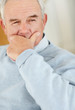 Closeup of a relaxed senior man looking away