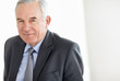 Closeup of a smiling business manager with copyspace
