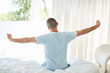 Middle aged man stretching his arms in the morning
