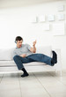 Crazy young guy enjoying the music - Indoor
