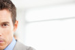 Micro view of a serious young business manager with copyspace