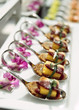 Canapes with cured ham on banquet table