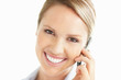 Closeup of a happy pretty young woman using a cellphone
