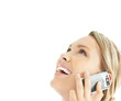 Cheerful young girl looks up at your text while using cellphone