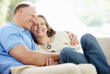 Foto: Happy mature couple spending their time together at home Happy mature couple spending their time together at home