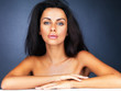 Sensuous female on blue background