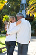 Happy mature couple walking outdoors