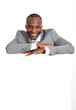 Businessman holding white message board
