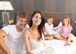 Photo: good morning - family in bed good morning - family in bed