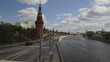 view from the bridge to traffic near the Kremlin and the river